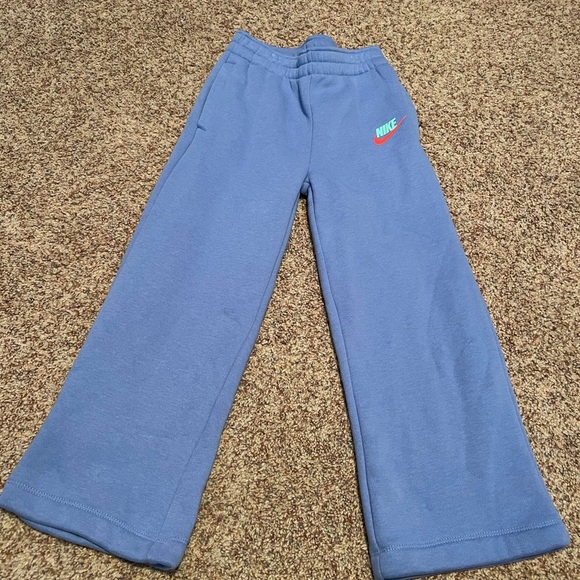 Nike Kids Joggers in Blue with Red Logo - Picture 1 of 1
